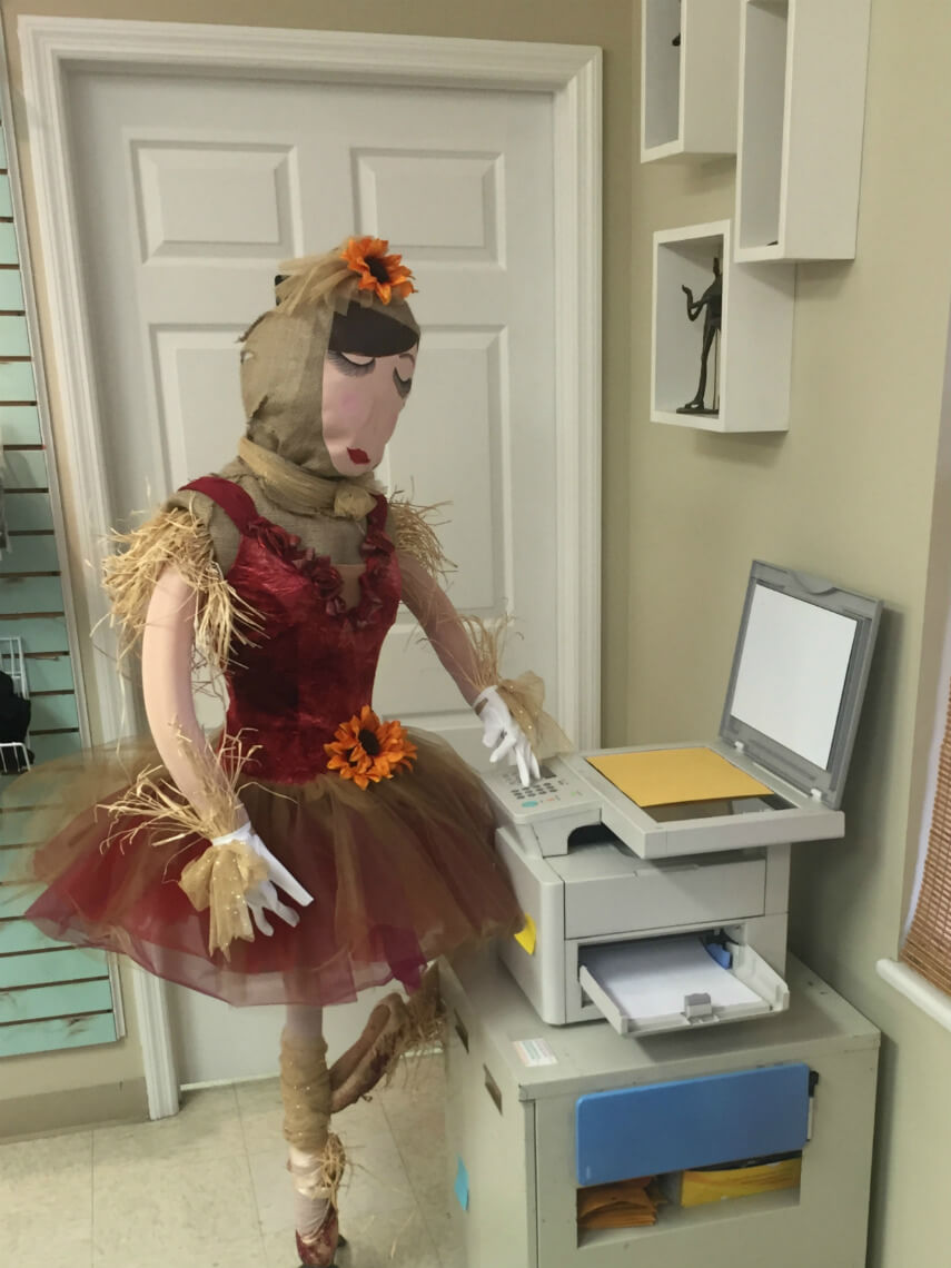 Scarecrow using the copier